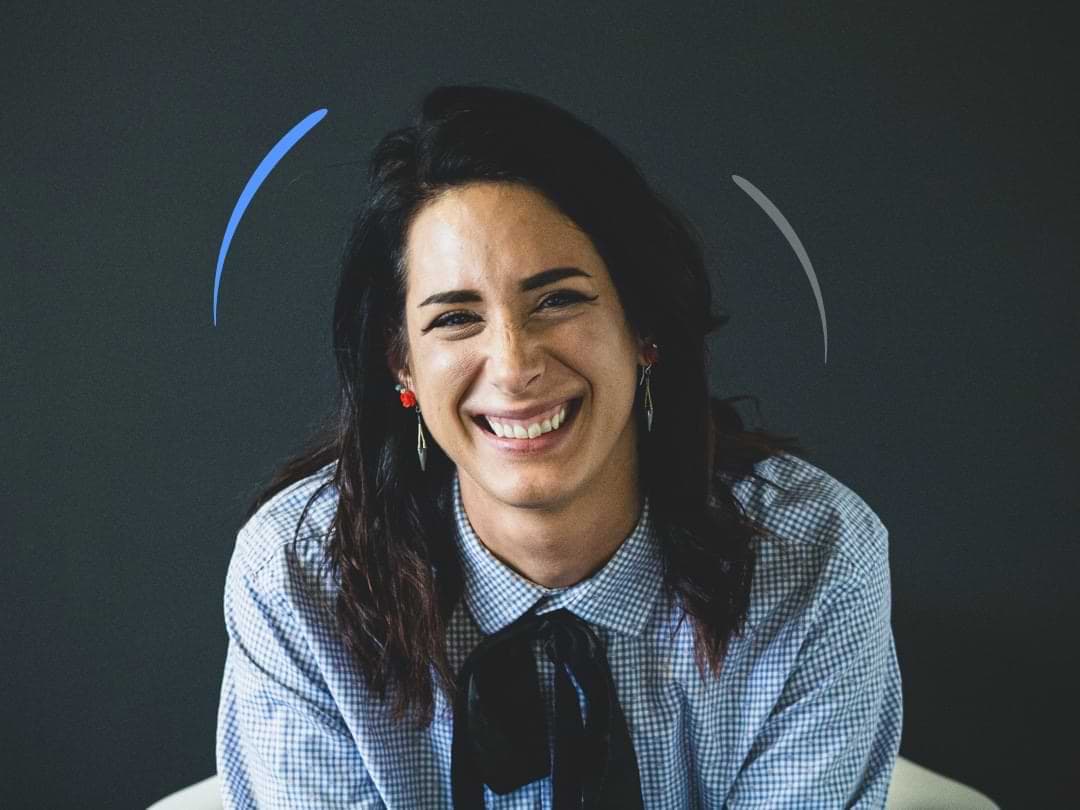 A founder laughing in a conversation